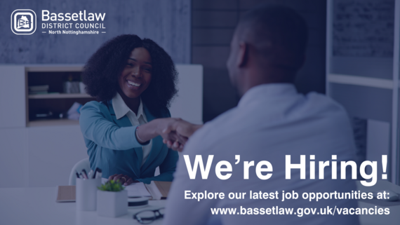 A man and a woman shaking hands.