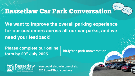 A row of cars parked in parking bays.