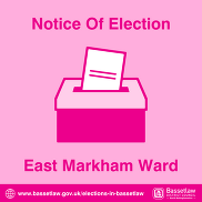Icon of a ballot box and paper.