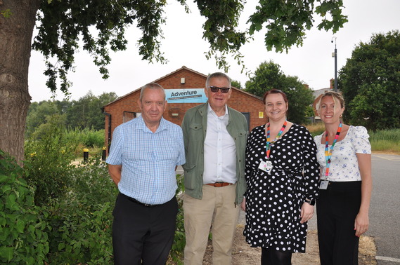 Cllr Darrell Pulk with Learning Hub staff.