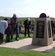 People looking around the Creswell Mining Disaster Memorial