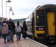 People boarding a train