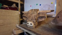 Wooden carving of a Highland Cow
