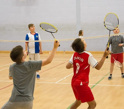 Children playing badminton