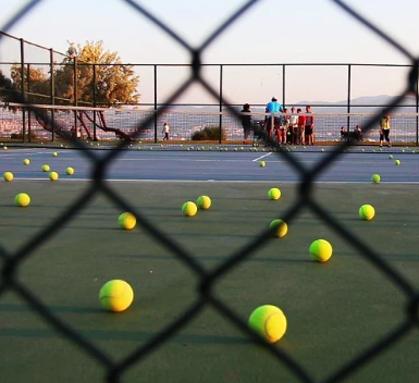 Tennis balls on a tennis court
