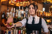 Bartender offering a drink