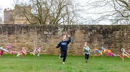 Two boys running at Hardwick Hall