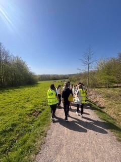 Group walking in Poulter parl