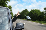 Plastic cup thrown from car