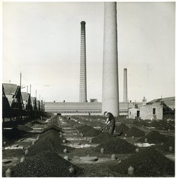 'Fuelling the brick firing kilns, London Brick Company, Stewartby', 1952 © The Mutual Security Agency