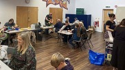Repair cafe, people having things fixed at Project 229