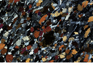 Thin section of an olivine gabbro used to determine the processes that led to the formation of the Oman Ophiolite. Source: BGS © UKRI