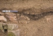 Cheviot Hills: detail of organic layer, or buried soil. BGS © UKRI.
