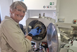Jane Evans with mass spectrometer. BGS © UKRI.