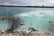 Sand mining settlement pond Malaysia. BGS © UKRI.