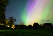 The aurora over West Linton on the Scottish borders. The aurora here is green, yellow, pink and purple. Credit: Jez Everest