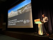 Tom Bide presenting on sustainable sand mining