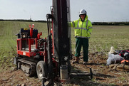 BGS scientist with drilling rig