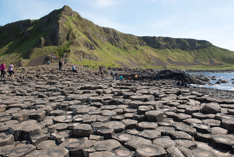 A landscape image of the Giant's Causeway, which shows the basalt columns. 
