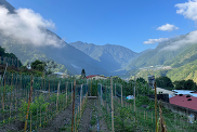 Looking upstream from the outskirts of Dongpu village toward Yushan mountain, the highest peak in Taiwan, standing at nearly 4000 m