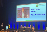 Professor Alan MacDonald receiving his Presidents' Award at 2026 World Groundwater Congress. 