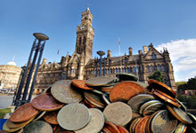Budget - coins outside City Hall
