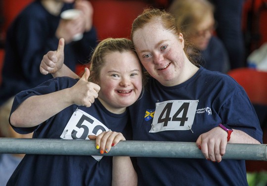 Special Olympics GB athletes celebrating at a recent competition