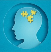 Blue background showing a silhouette of a head with yellow jigsaw pieces in the area where the brain is