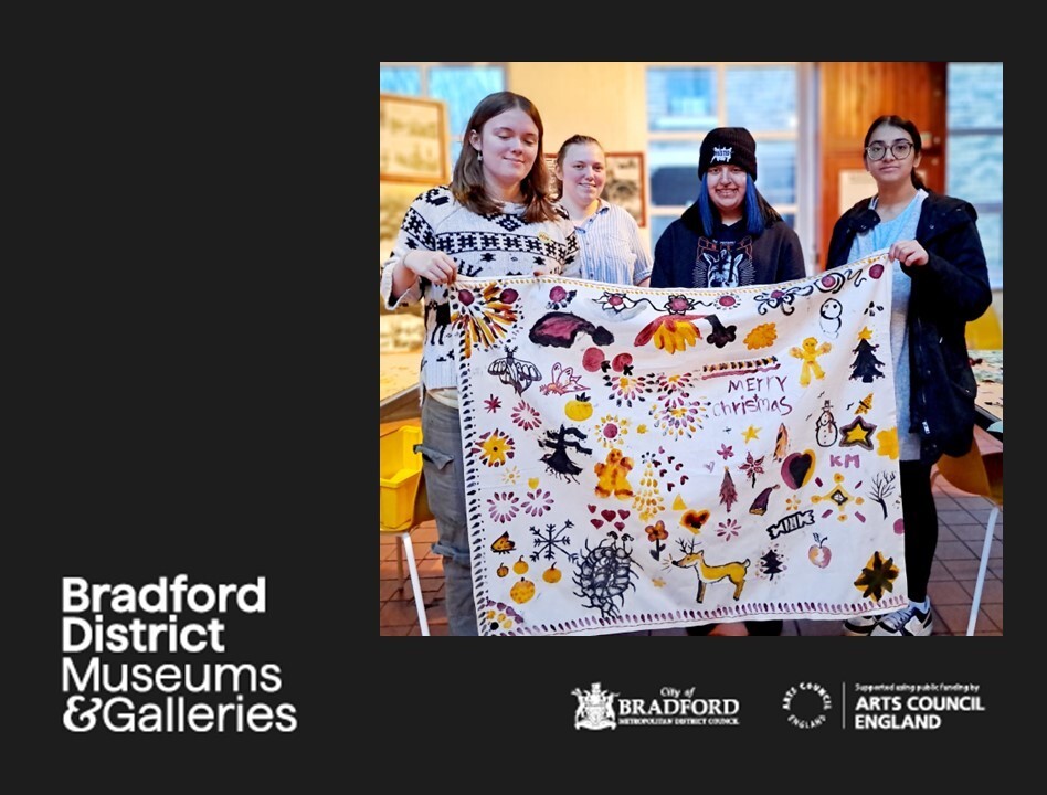 young ambassadors holding a darkastan (tablecloth)