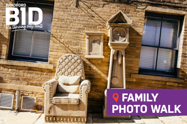 Photograph of Little Germany Bradford with stone chair and clock