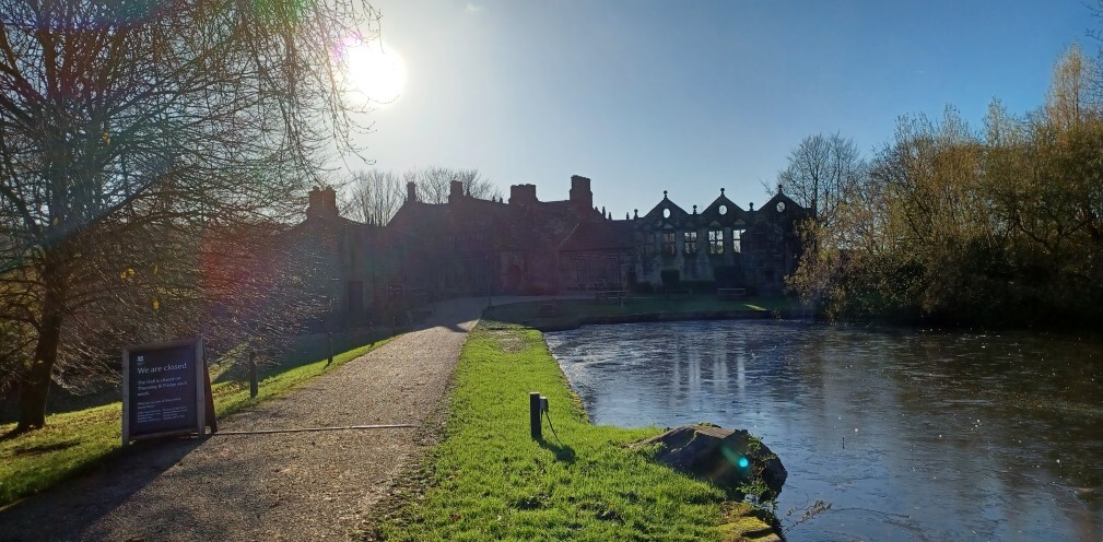 A old building by a lake