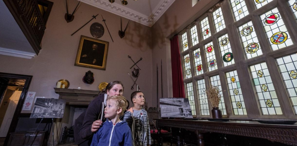 People looking around a large room