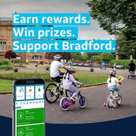 BetterPoints poster and photo of person on a bicycle