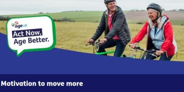 man and woman aged around 65 riding bikes on grass