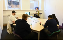People sat round in a circle