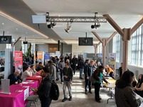People at jobs fair stalls