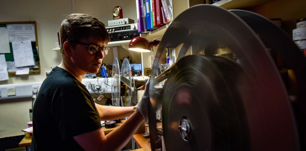 A person working with film