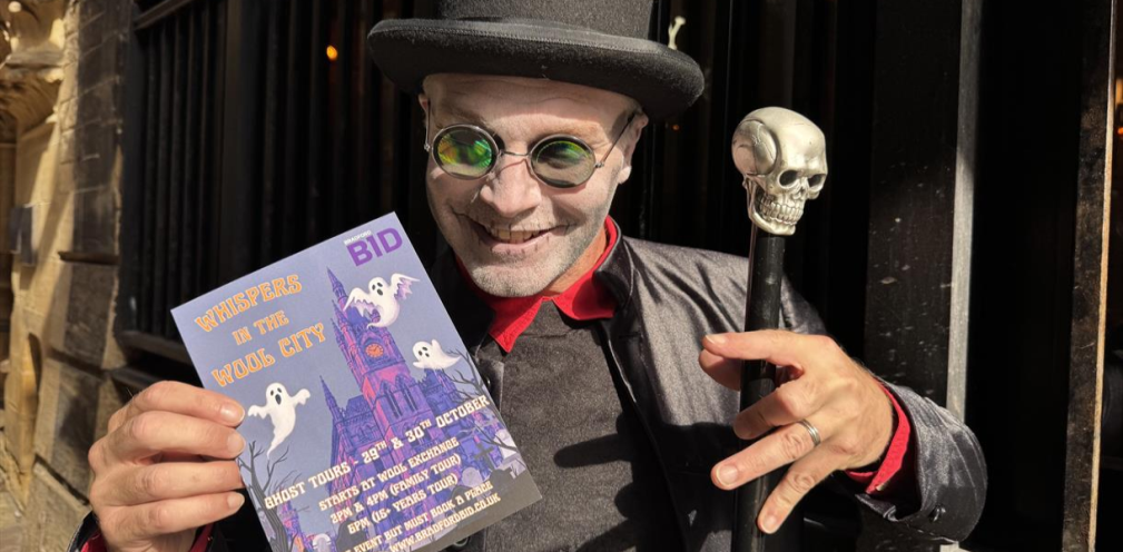 A man holding a leaflet