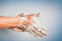 close up of hands washing