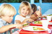 children eating at restaurant