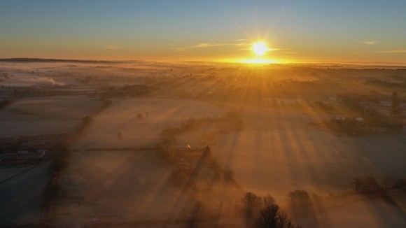 Aerial view of countryside at dawn