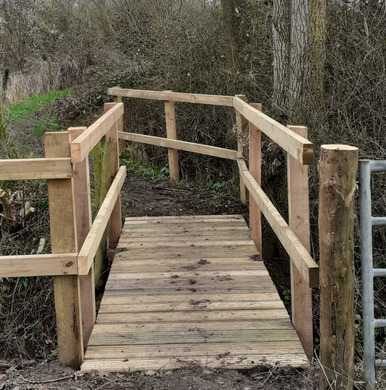New wooden footbridge