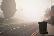 Bin sitting on road side