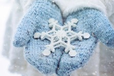 Snowflake in a pair of gloves