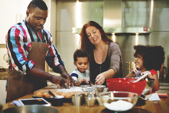 Family in the kitchen cooking together