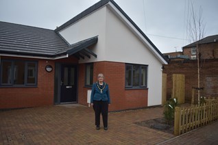 Broxtowe Borough Mayor - Cllr Janet standing outside Dementia friendly home in Beeston