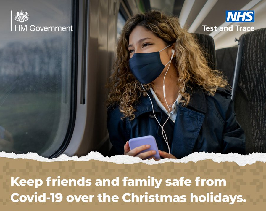 Keep friends and family safe from COVID-19 over Christmas a woman in a mask on a train