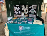 Housing gazebo with information on services on the tables