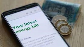 A phone showing 'your latest energy bill'