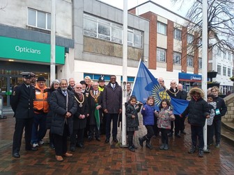 Students from Round Hill, the Vice Lord-Lieutenant of Nottinghamshire, Dame Elizabeth Fradd, the Mayor and guests gathered with the Commonwealth flag